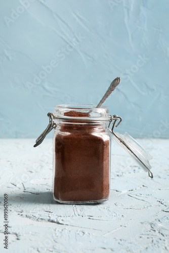 Jar with coffee powder on l...