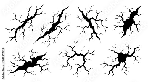 Set of cracked earth or damaged surface graphic elements