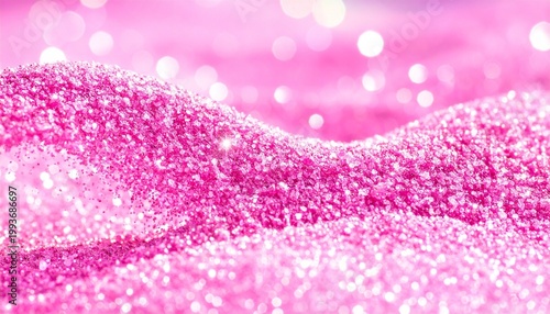 Pink glitter surface with sparkling bokeh light reflections close-up