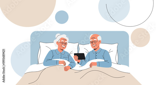 Elderly couple engages with technology in bed, promoting connectivity and shared experiences at