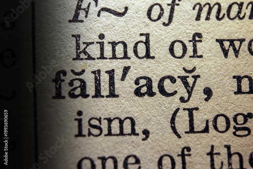 Canvas Print Word fallacy printed on dictionary page, macro close up