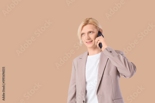 Young blonde businessman ta...