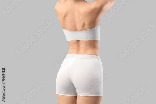 Young woman in underwear on...