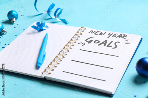 Notebook with New Year goal...