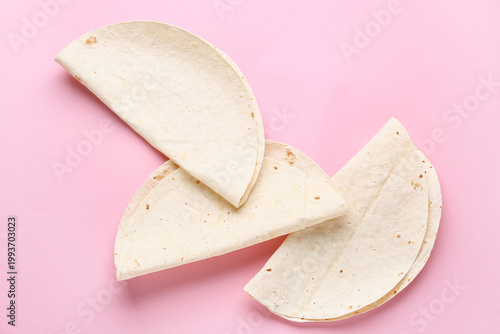 Fresh thin lavash on pink b...