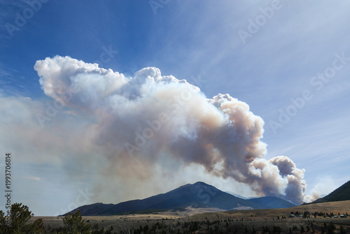 Fotografie Start of a raging forest wildfire crisis in the wilderness of Montana in the wes