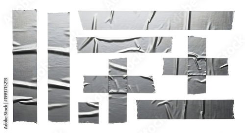 Collection of silver adhesive duct tape strips and cross shapes with wrinkled metallic texture on black