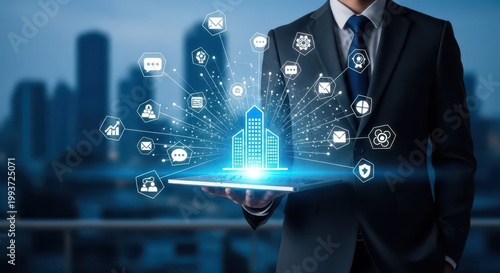 Businessman in suit holding tablet with glowing blue cityscape and icons floating above, representing modern technology and urban development