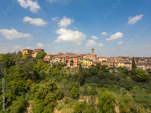 Italy, 10 April 2026: Aerial drone view of Dozza medieval village in Emilia Romagna, featuring the historic Rocca Sforzesca fortress, colorful murals, tiled rooftops, and scenic Italian countryside la