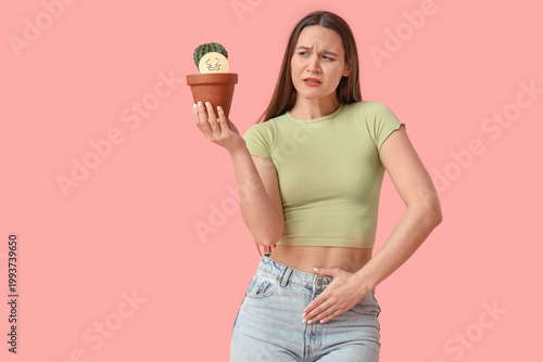 Suffering young woman with ...