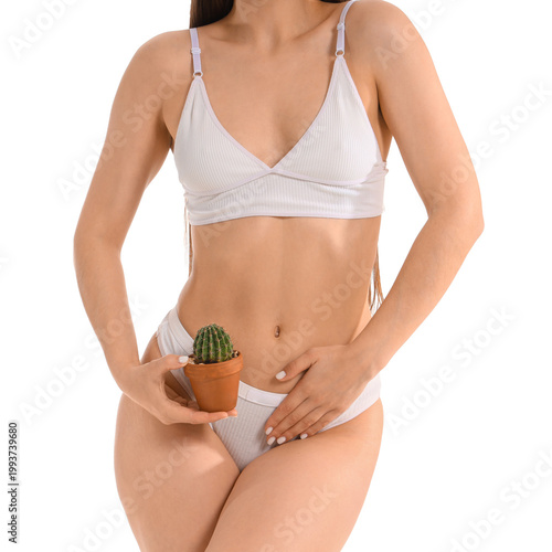 Young woman with cactus on ...