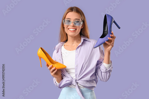 Stylish young woman with hi...