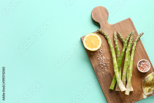 Wooden board with fresh gre...