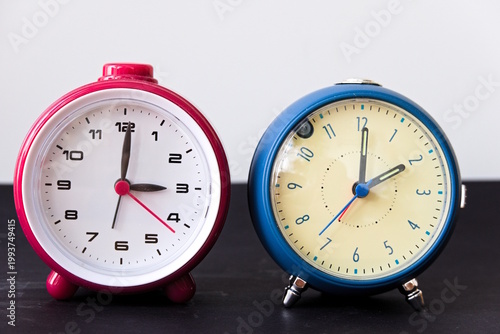 Daylight Saving Time Concept with Two Alarm Clocks