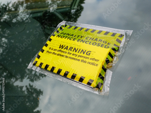 Penalty charge notice or parking fine on windscreen of car, England, UK