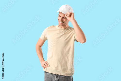 Young man in beige t-shirt ...
