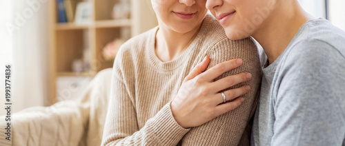 support comfort embrace tenderness cozy home trust connection warmth care gentle shoulder embrace on a couch conveys reassurance warmth and safety for calm wellness and support themes