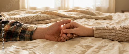 support comfort care holding hands empathy warmth cozy home connection warm handholding over a plaid blanket shows empathy patience and human closeness for recovery wellness and comforting care themes