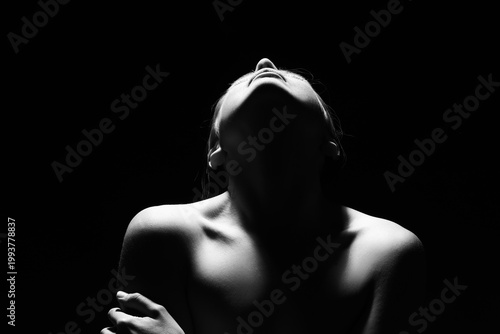 Silhouette of young woman o...