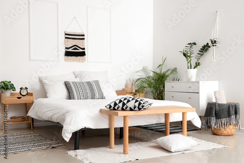 Interior of light bedroom w...