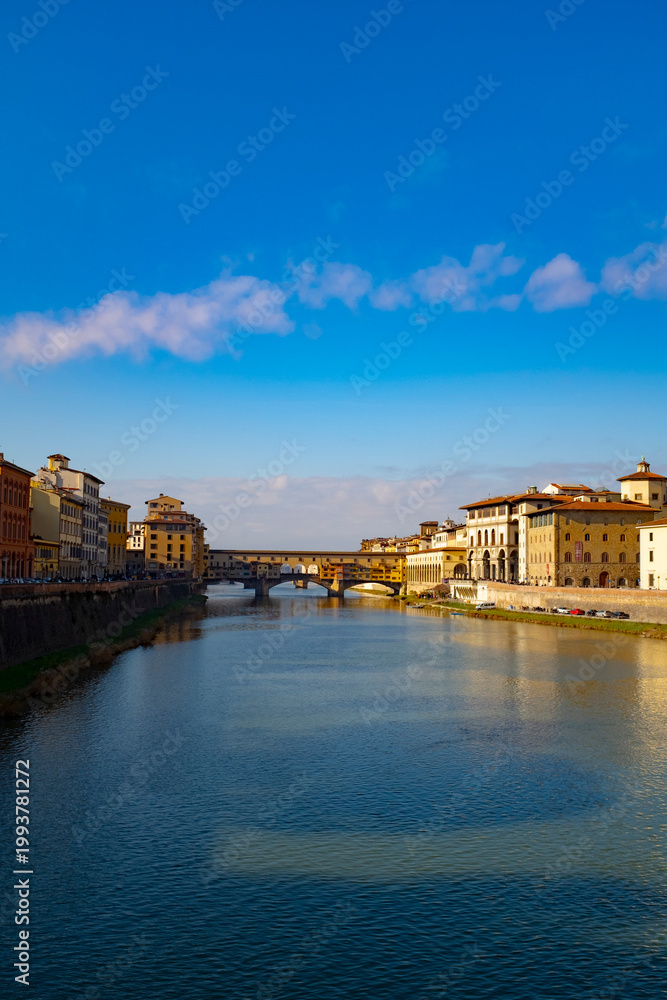 Fototapeta premium Beautiful Ponte Vecchio bridge landmark over the Arno bridge in the beautiful old city of Florence, Italy