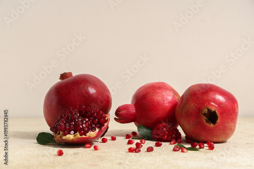 Fresh whole and cut pomegra...