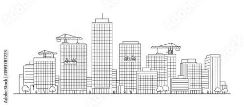 City skyline with construction cranes and suspended platforms downtown