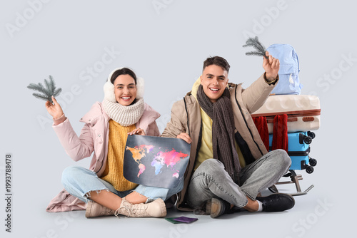 Cute young couple with worl...