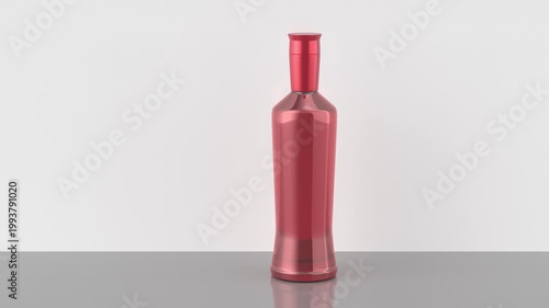 Red liqueur bottle on a shiny grey table