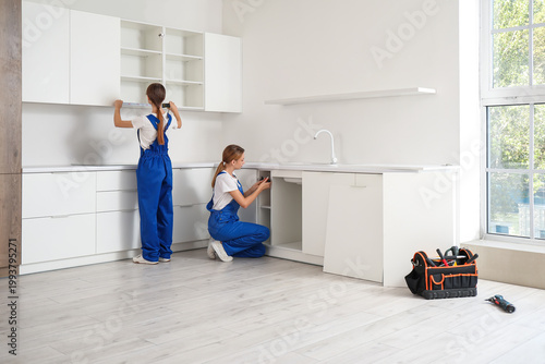 Female workers assembling f...