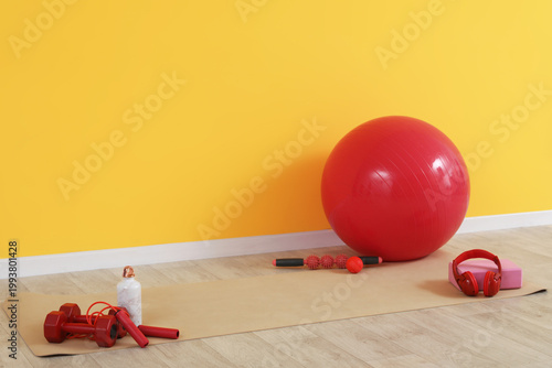 Fitball with sports equipme...