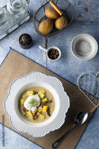 Kulajda soup with poached egg and mushrooms