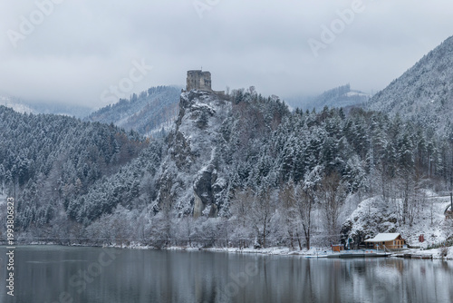 Stary hrad castle ruins on mountain overlooking river Vah