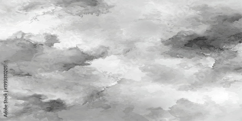 Dramatic dark storm clouds gathering over a bright blue summer sky create an abstract nature background with gray overcast layers and a touch of light before the rain