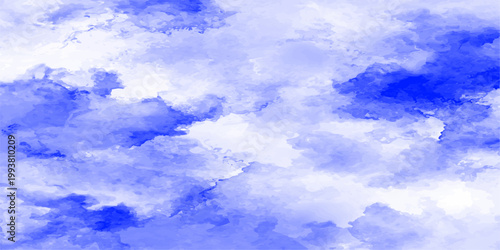 A beautiful blue sky with fluffy white clouds on a bright sunny day creates a clear summer cloudscape and a peaceful atmosphere of natural beauty outdoors