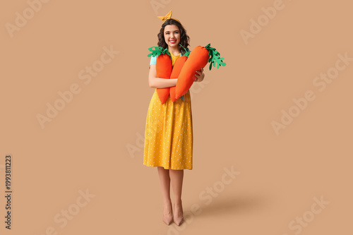 Happy pin-up woman holding ...