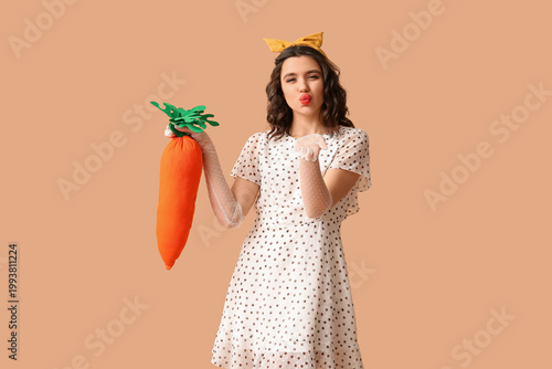 Beautiful pin-up woman hold...