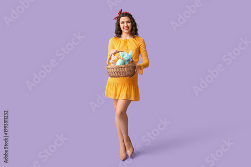 Beautiful pin-up woman hold...