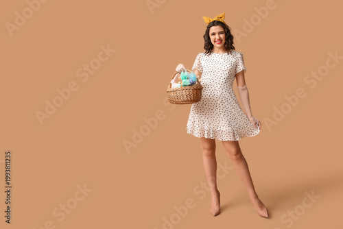 Happy pin-up woman holding ...