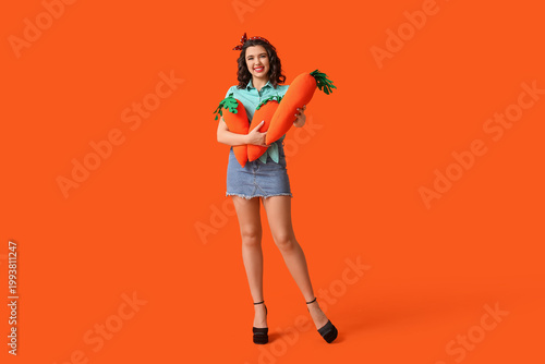 Happy pin-up woman holding ...