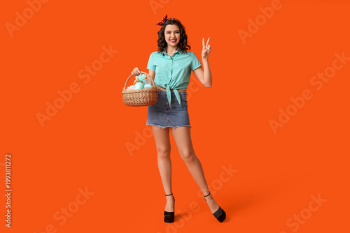 Beautiful pin-up woman hold...