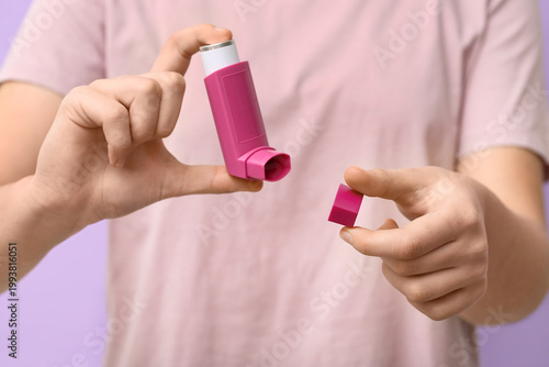 Child with asthma inhaler o...