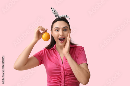 Shocked young woman with ta...