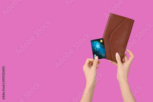 Woman with credit card and ...