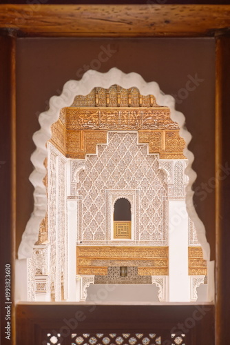 Second floor window of a dormitory room on the Ben Youssef Madrasa courtyard NE side amidst lavish stucco and wood decoration. Marrakesh-Morocco-308