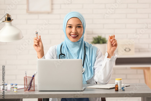 Female Muslim doctor in hij...