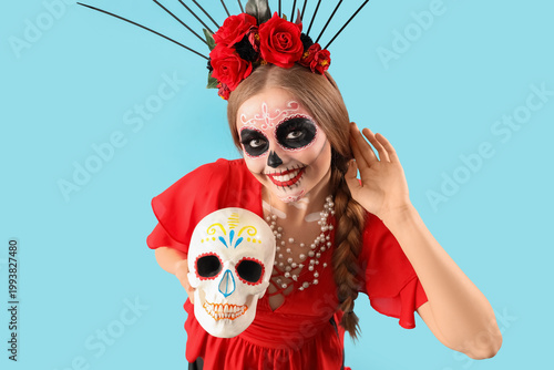 Young woman with painted sk...