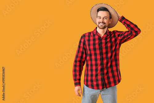 Handsome man on yellow back...