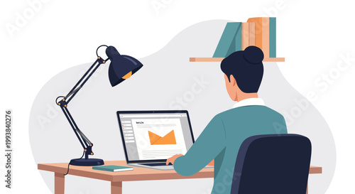 Person works at a desk using a laptop during the day in a simple office setup with a lamp and shelf