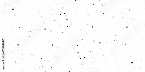 High resolution seamless terrazzo texture with black and beige marble chips on white background for interior design. dense distribution of organic black and tan marble fragments on a crisp white base
